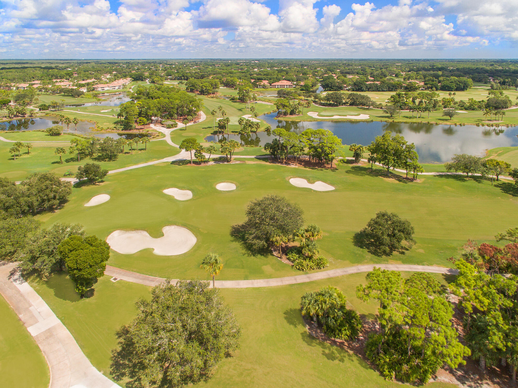 25 Commodore Place Palm Beach Gardens, FL 33418 - Photo 53 of 68 a view of a lake