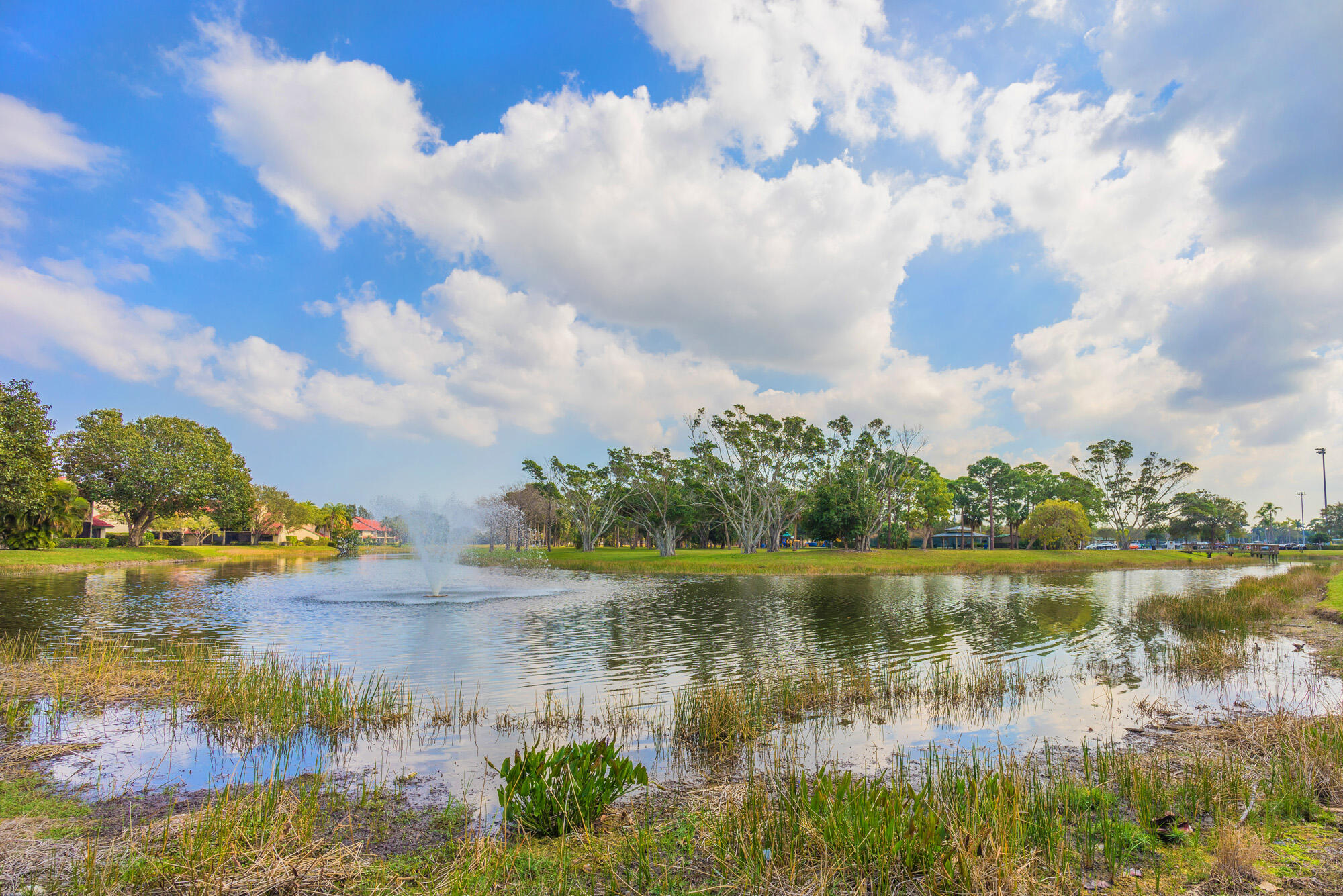 25 Commodore Place Palm Beach Gardens, FL 33418 - Photo 58 of 68 a view of lake with green space