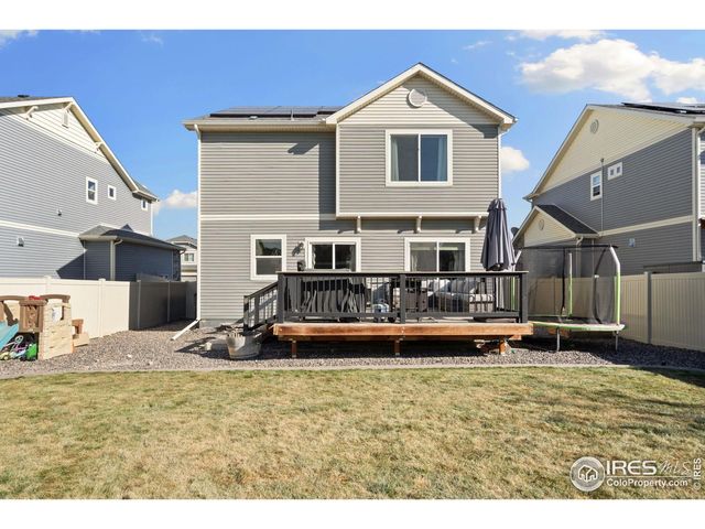 a view of a house with a swimming pool