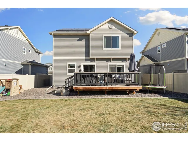 a view of a house with a swimming pool