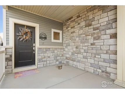 a bathroom with a shower and a sink