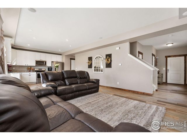 a living room with furniture and a couch