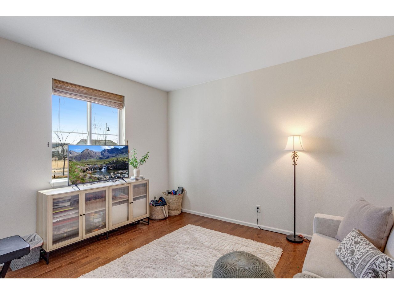 12715 Eagle River Road Firestone, CO 80504 - Photo 11 of 28 Versatile main-level flex space-perfect for a home office, playroom, or additional living area