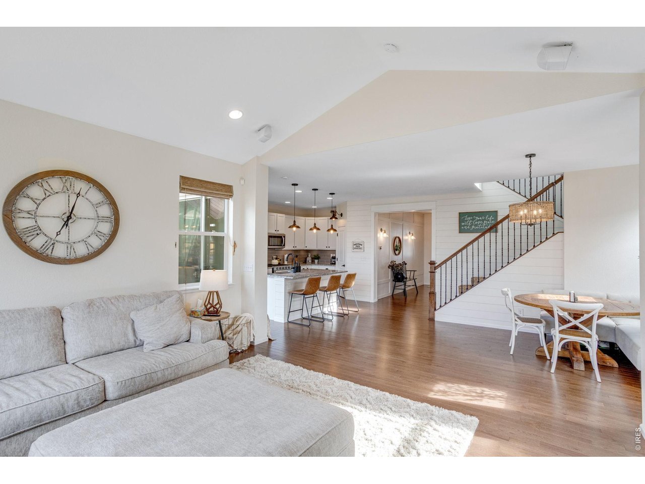 12715 Eagle River Road Firestone, CO 80504 - Photo 8 of 28 Seamless open layout connecting living, dining, and kitchen-ideal for entertaining.