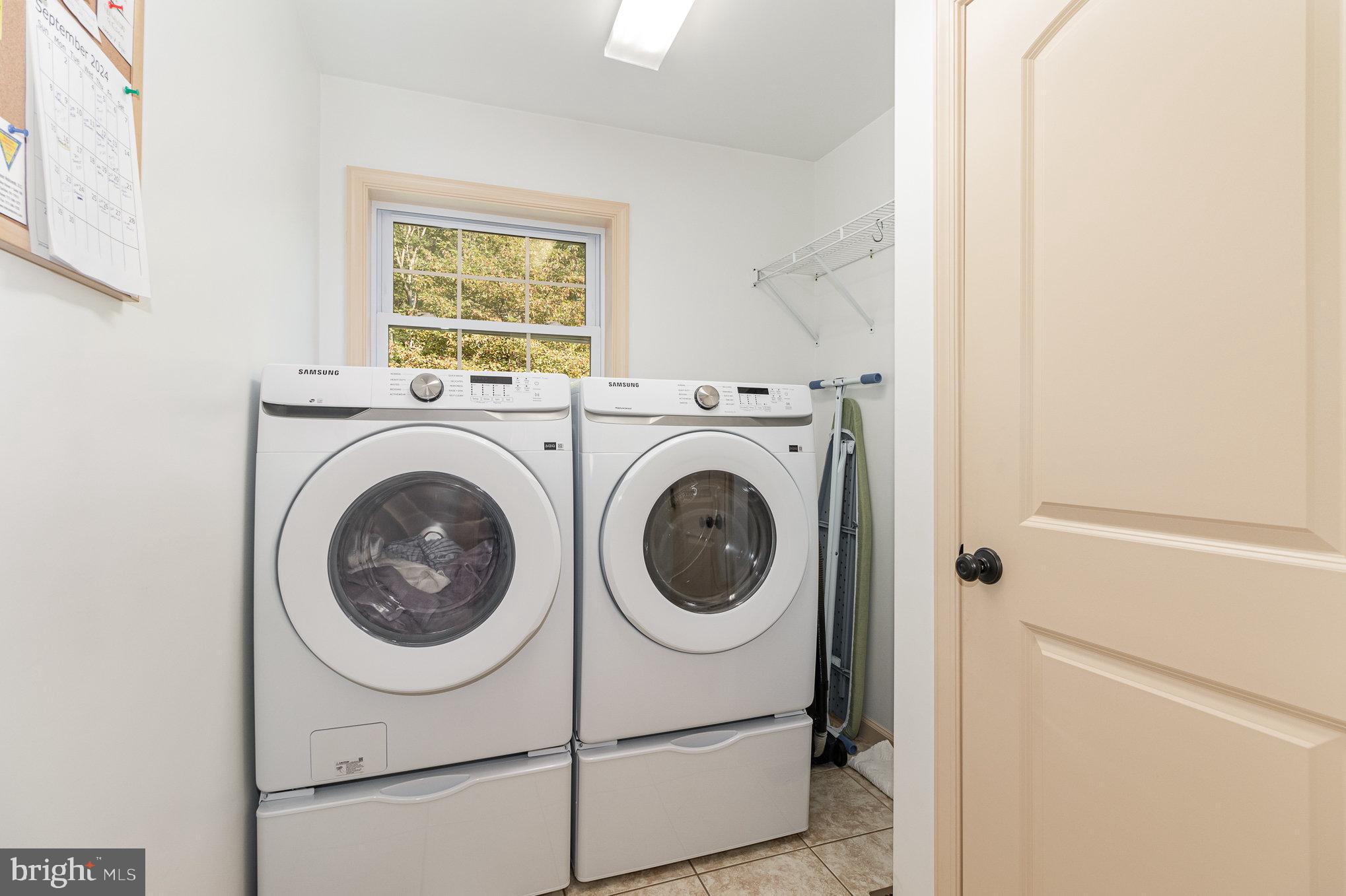 1127 Kuhn Road Boiling Springs, PA 17007 - Photo 16 of 46 Laundry Room w/Pocket Door