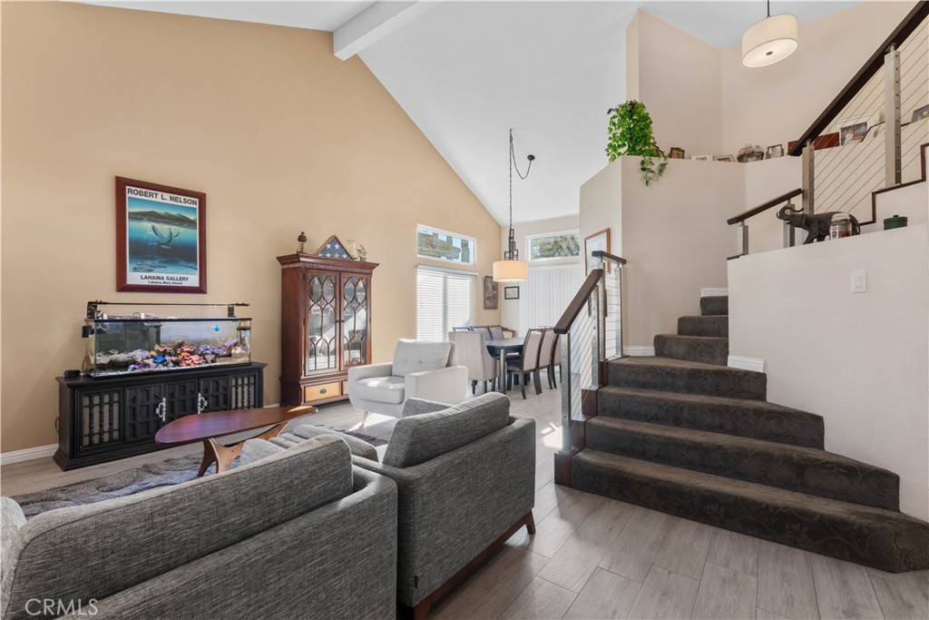 10963 San Mateo Place Rancho Cucamonga, CA 91701 - Photo 6 of 37 a living room with furniture and a fireplace