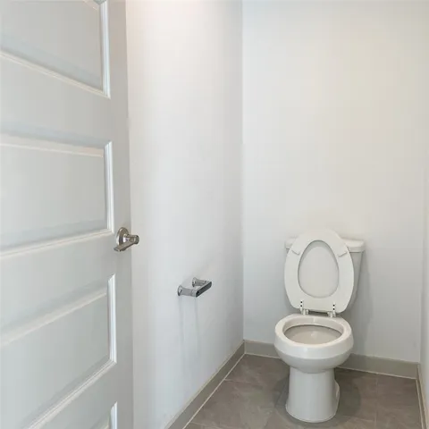 a bathroom with a toilet and a sink
