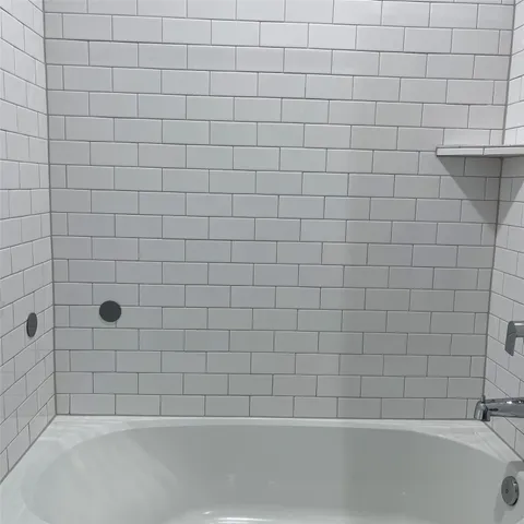 a bathroom with a bathtub