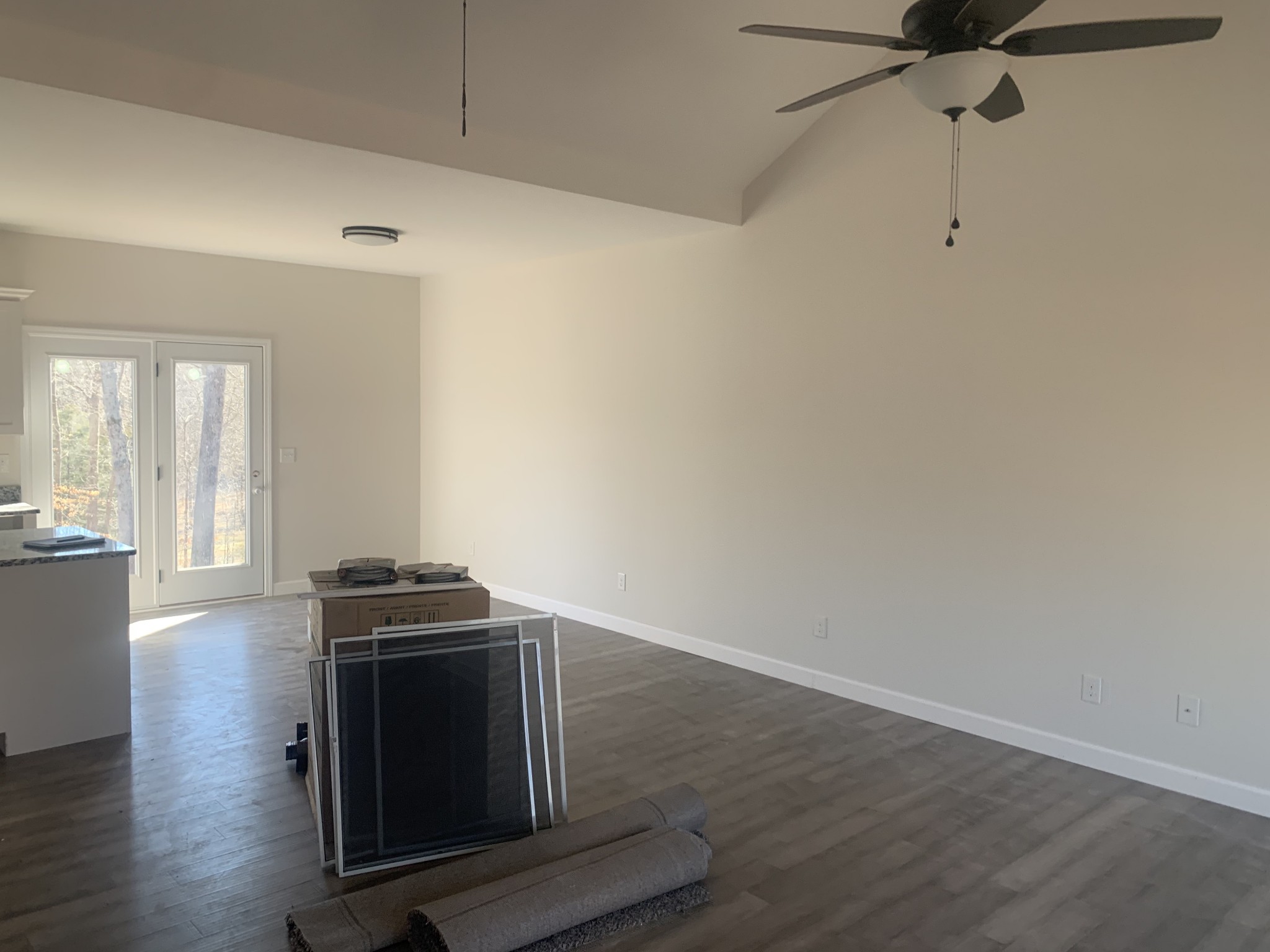 276 A Murrell Road Dickson, TN 37055 - Photo 4 of 8 a room with wooden floor and stainless steel appliances