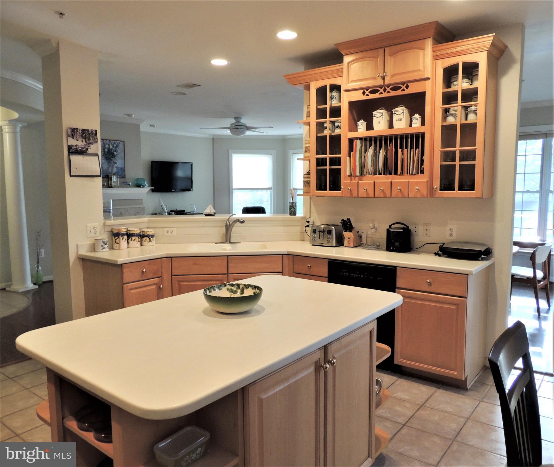 602 Runabout Loop Solomons, MD 20688 - Photo 7 of 30 Kitchen with china cabinet and island