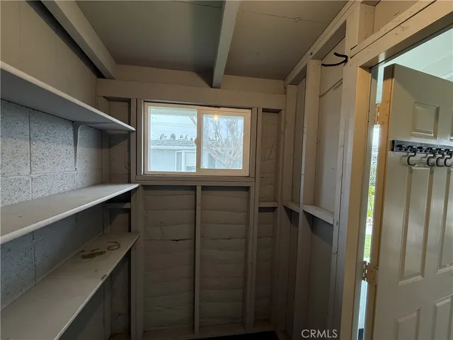a view of storage and utility room