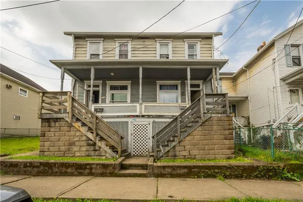 front view of a house with a balcony