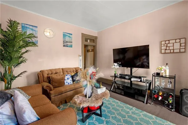 a living room with furniture and a couch