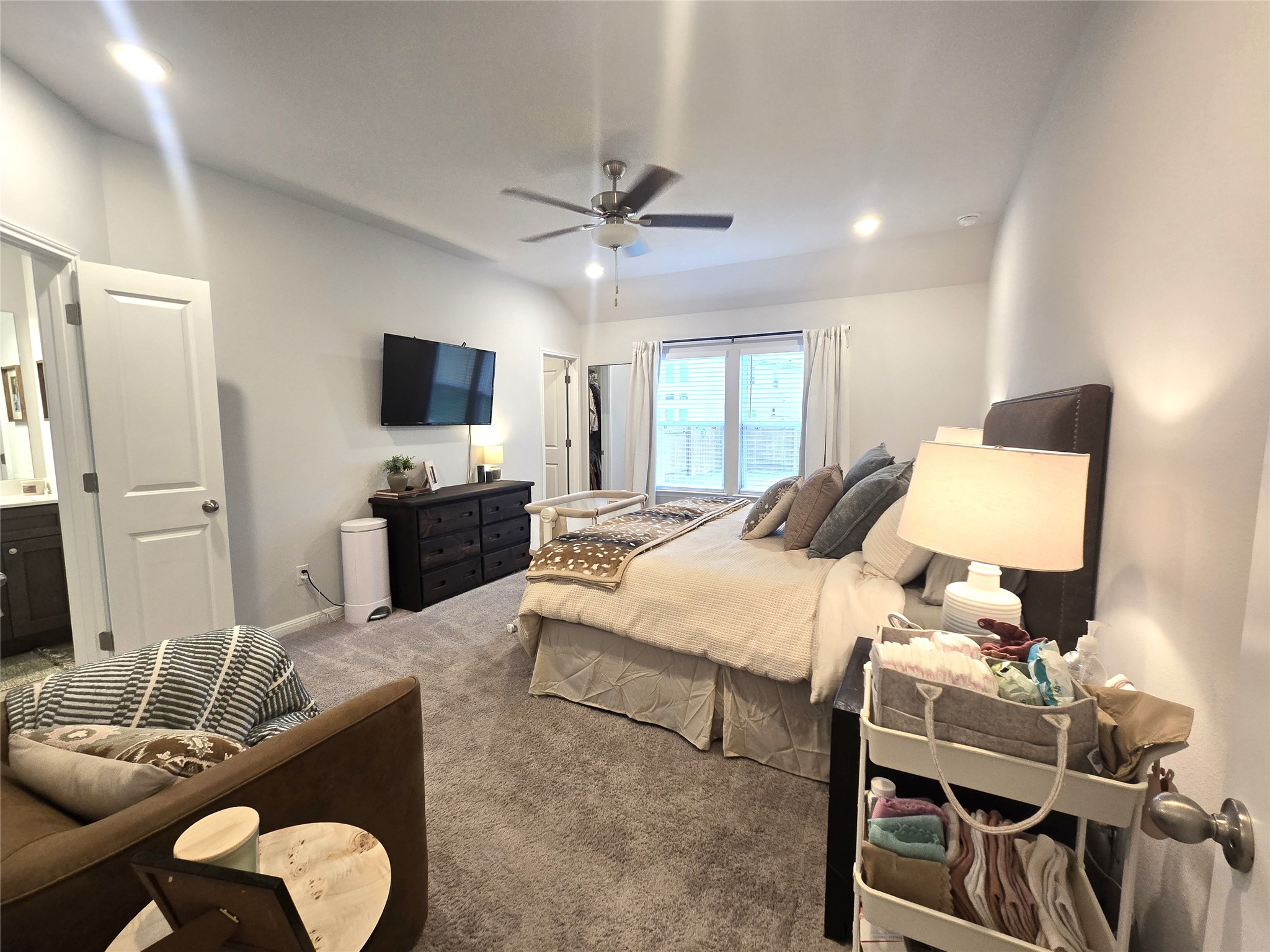 133 Boulder Ridge Trail Liberty Hill, TX 78642 - Photo 14 of 32 Bedroom featuring carpet flooring, a closet, ceiling fan, and recessed lighting