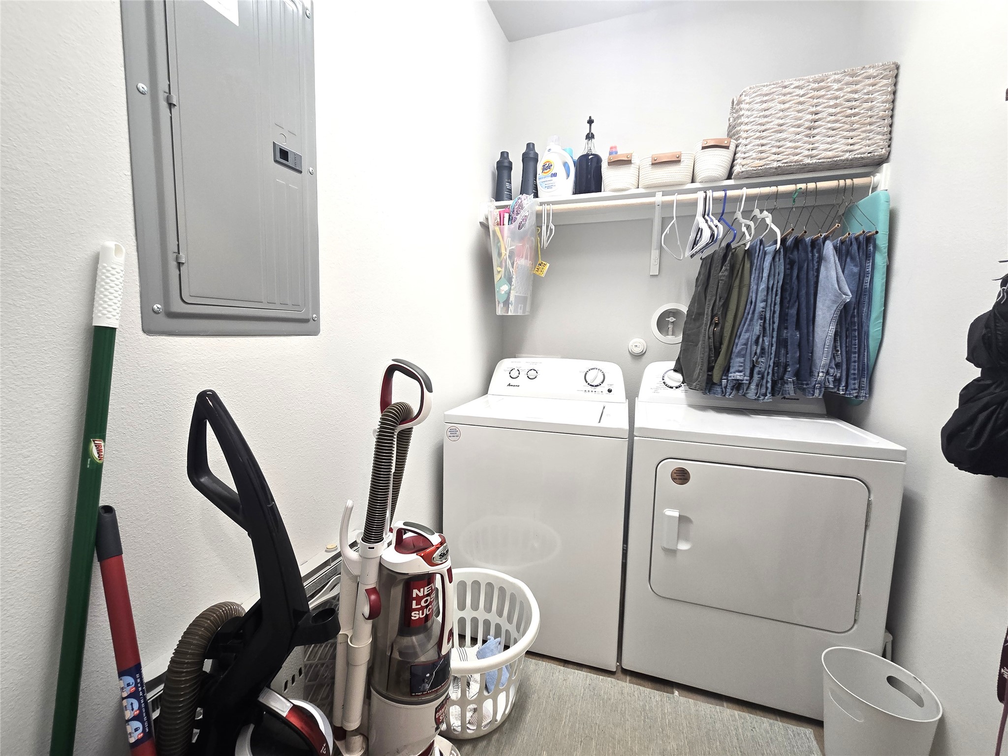 133 Boulder Ridge Trail Liberty Hill, TX 78642 - Photo 20 of 32 Laundry area with electric panel and independent washer and dryer