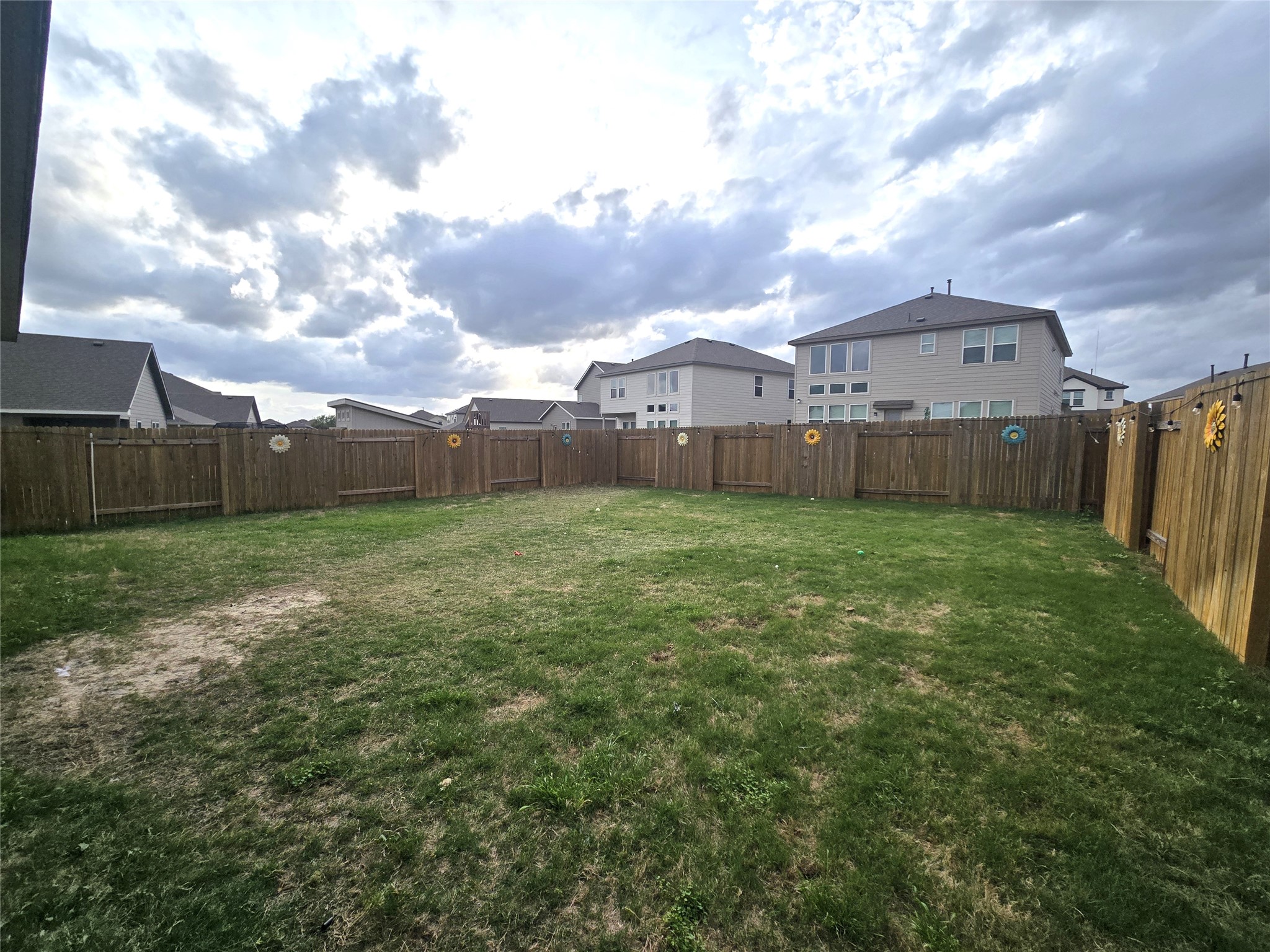 133 Boulder Ridge Trail Liberty Hill, TX 78642 - Photo 26 of 32 Fenced backyard with a residential view