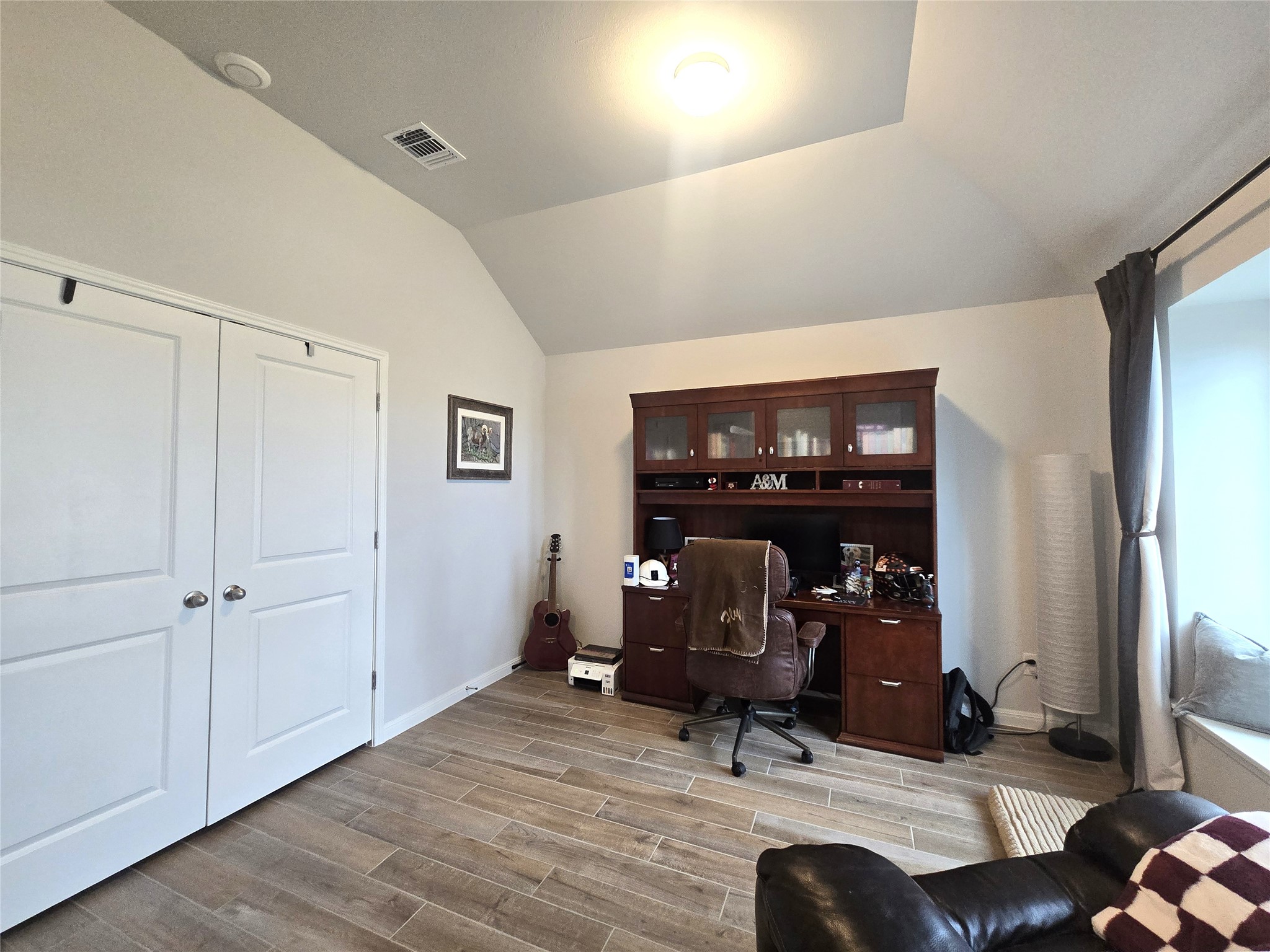133 Boulder Ridge Trail Liberty Hill, TX 78642 - Photo 5 of 32 Home office with vaulted ceiling and wood tiled floors