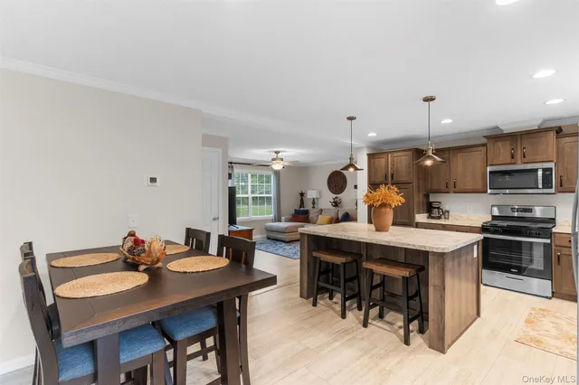 a view of a dining room with furniture