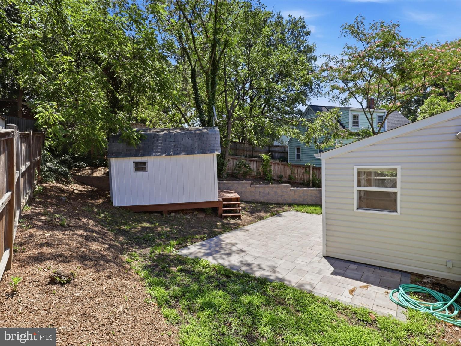 6003 Rixey Drive Alexandria, VA 22303 - Photo 37 of 37 Rear view of the home with shed.