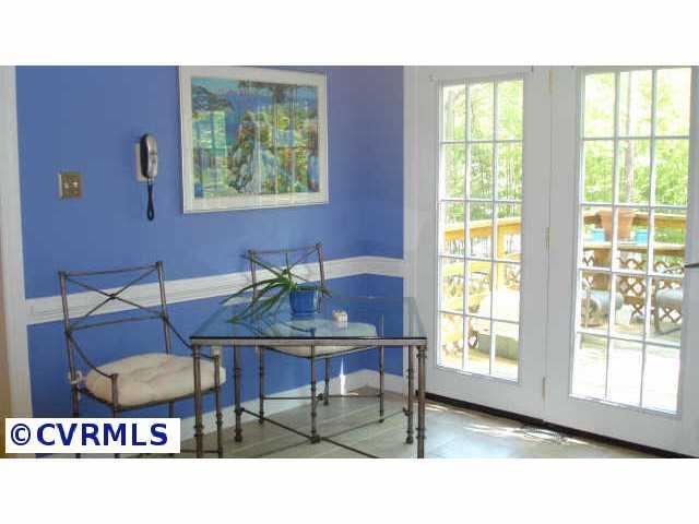 10215 Rounding Run Henrico, VA 23238 - Photo 4 of 10 Other - Bright & sunny eatin kitchen, tile floors, doors to rear deck