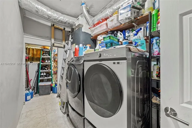 a view of a house with backyard porch and sitting area