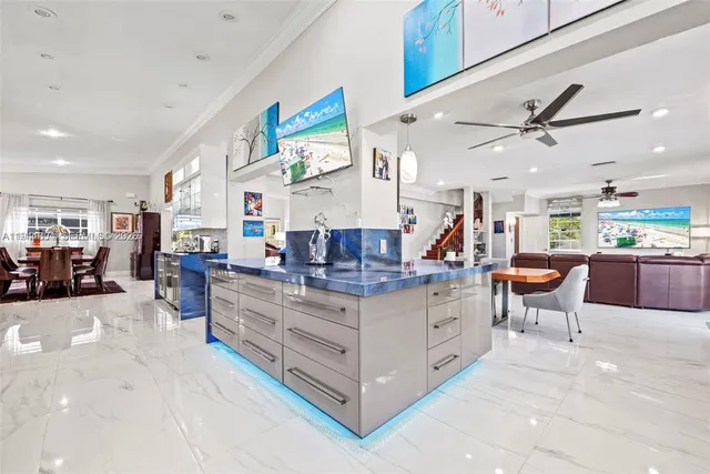 a view of a kitchen and living room