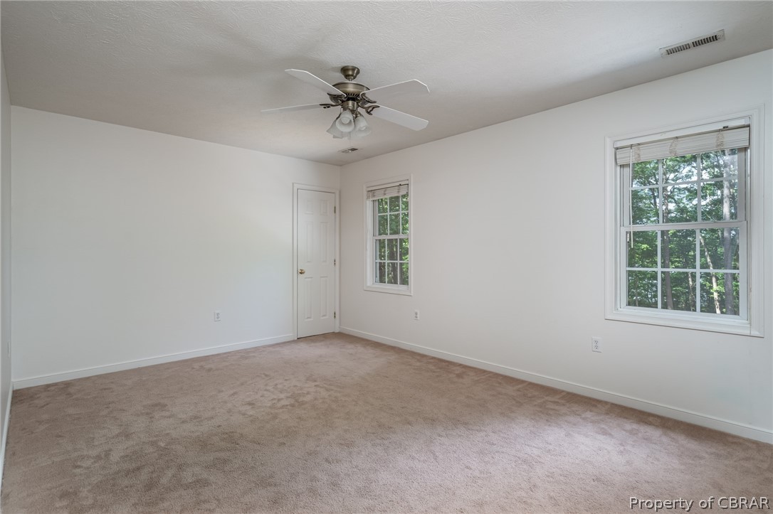 9313 South Courthouse Road Providence Forge, VA 23140 - Photo 27 of 35 a view of an empty room with a window