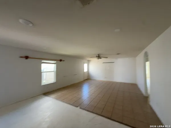 a kitchen with stainless steel appliances granite countertop a sink stove and microwave