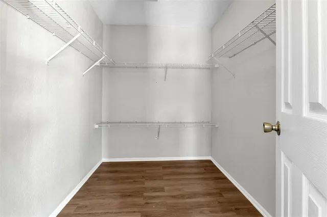 a view of a room with racks on the wall