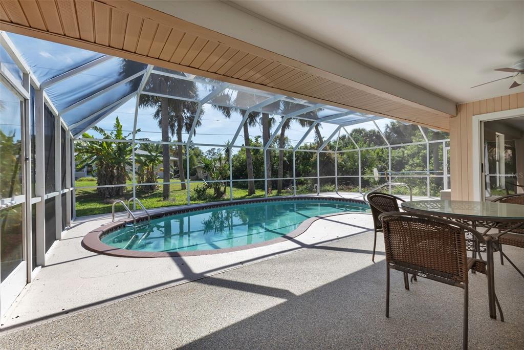23177 Rye Avenue Punta Gorda, FL 33980 - Photo 31 of 48 a view of backyard with swimming pool and outdoor seating