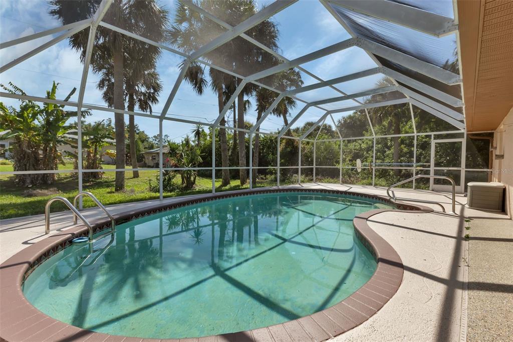 23177 Rye Avenue Punta Gorda, FL 33980 - Photo 32 of 48 a view of a swimming pool with a patio