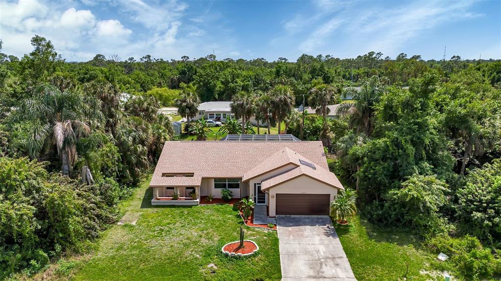 23177 Rye Avenue Punta Gorda, FL 33980 - Photo 43 of 48 an aerial view of a house next to a yard