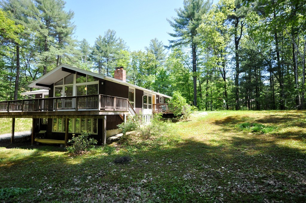 136 Temple Road Concord, MA 01742 - Photo 1 of 27 a view of a house with a yard and sitting area