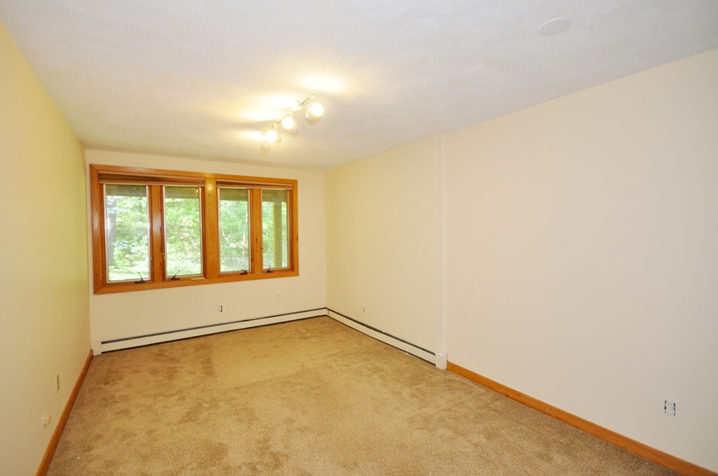 136 Temple Road Concord, MA 01742 - Photo 19 of 27 an empty room with a empty space and a window