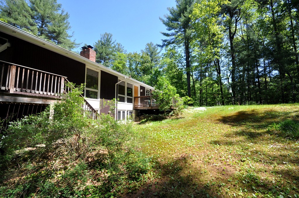 136 Temple Road Concord, MA 01742 - Photo 26 of 27 a view of a house with backyard and sitting area
