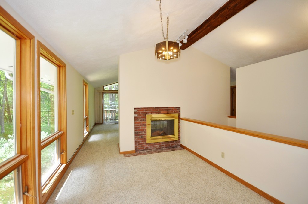 136 Temple Road Concord, MA 01742 - Photo 3 of 27 a view of an empty room with a window