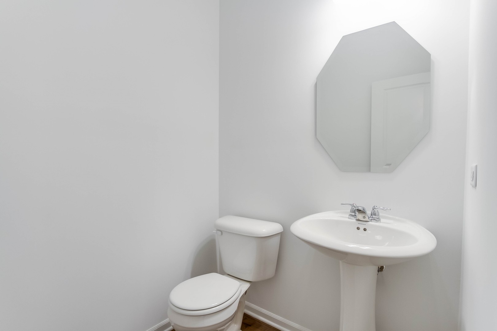 25501 West Emory Lane Plainfield, IL 60544 - Photo 15 of 28 a bathroom with a sink a toilet and a mirror