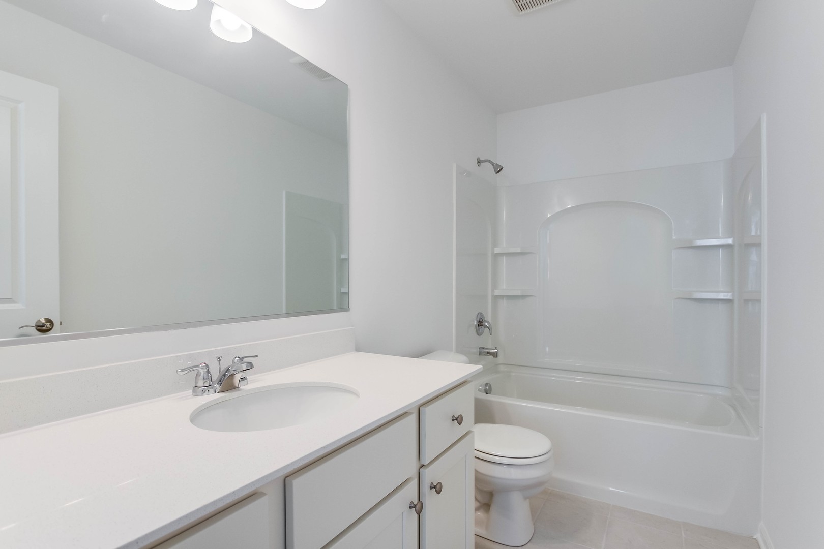 25501 West Emory Lane Plainfield, IL 60544 - Photo 23 of 28 a bathroom with a sink a toilet and shower