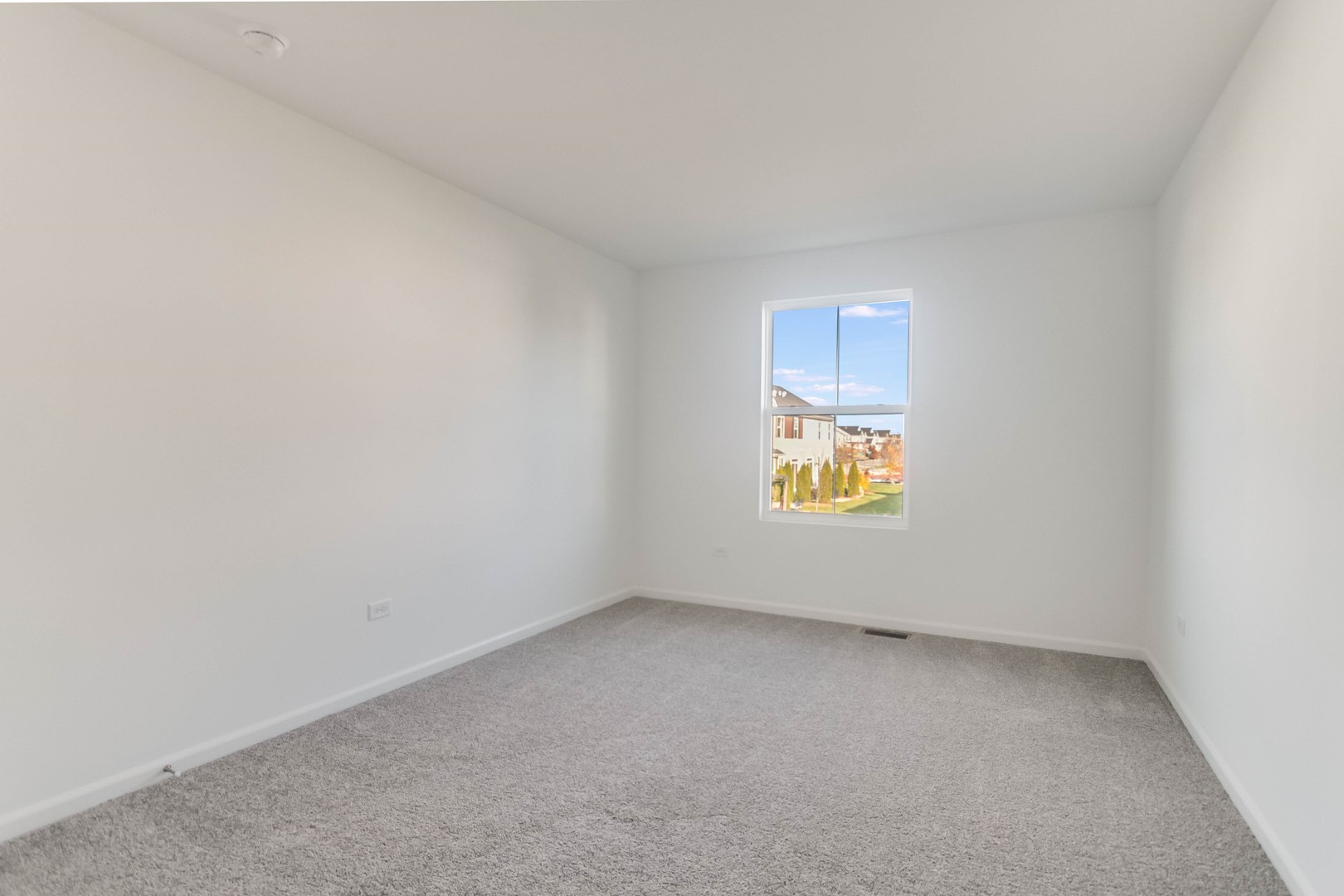 25501 West Emory Lane Plainfield, IL 60544 - Photo 25 of 28 an empty room with windows