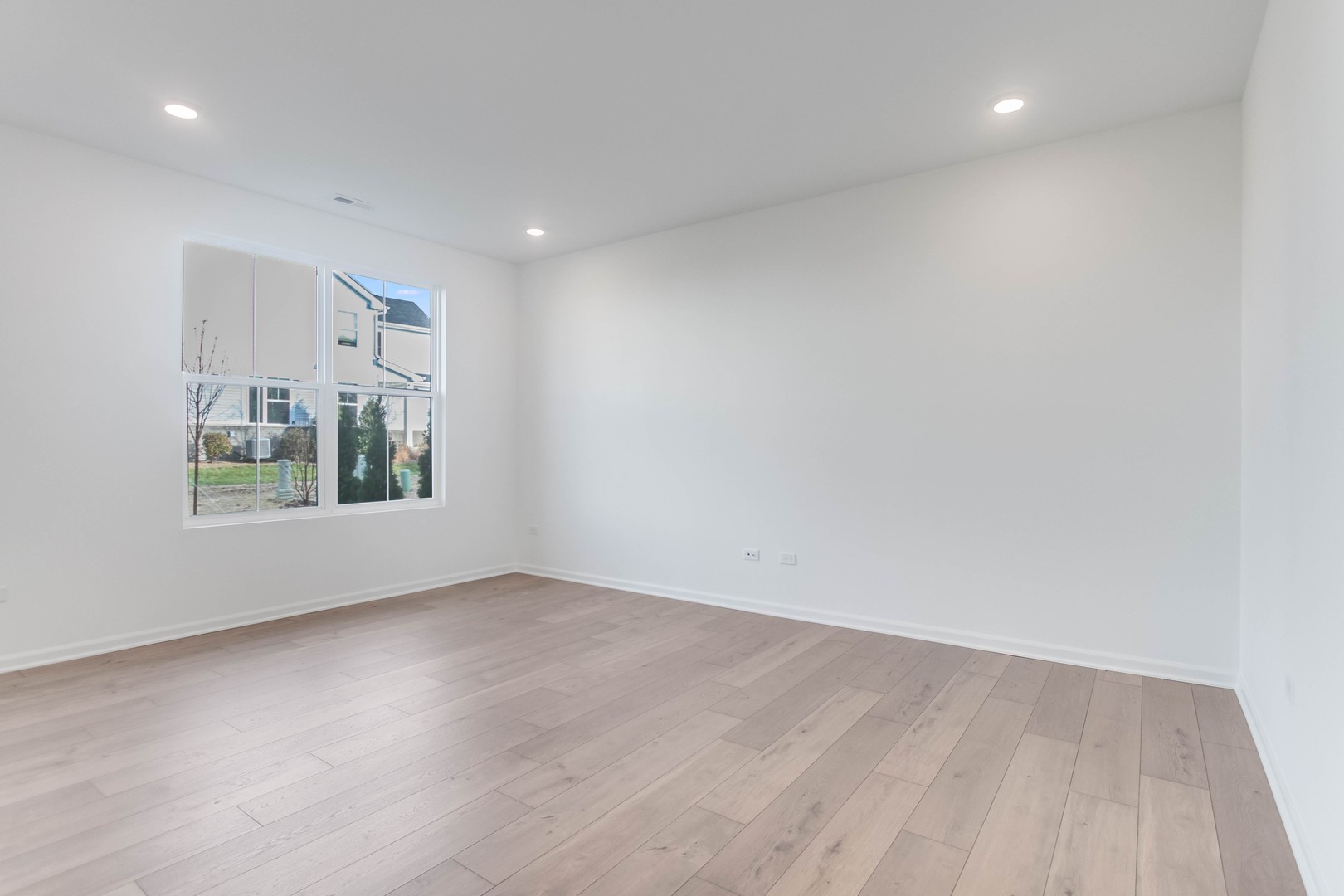 25501 West Emory Lane Plainfield, IL 60544 - Photo 5 of 28 a view of an empty room with a window
