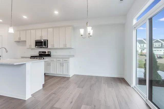 a view of an empty room with glass door