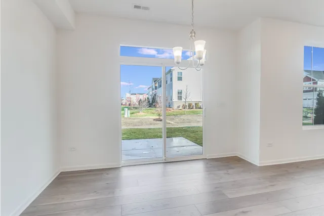 a kitchen with stainless steel appliances granite countertop a sink stove and microwave