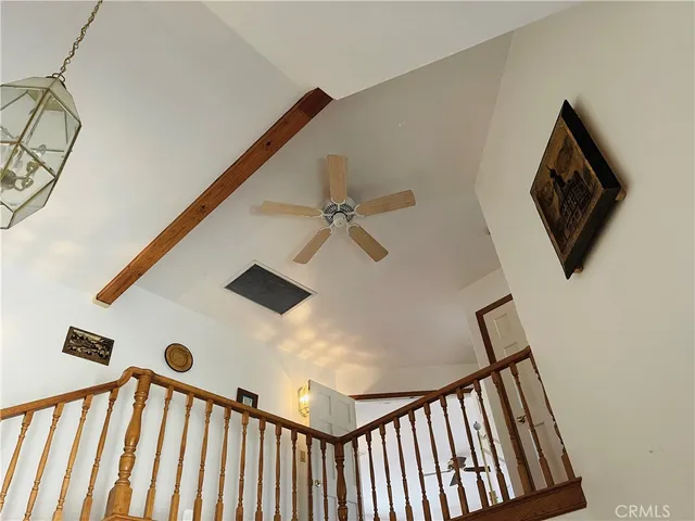 a bed sitting in a room next to a window