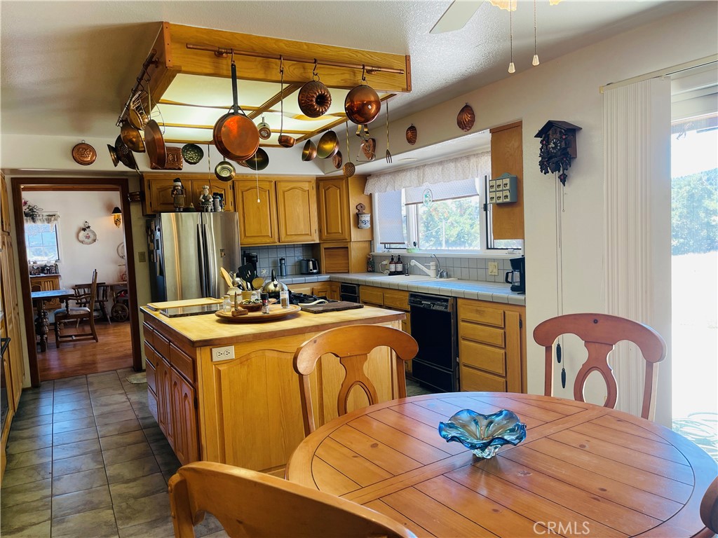 10500 Steinhoff Road Frazier Park, CA 93225 - Photo 40 of 75 a view of a dining room with furniture and wooden floor