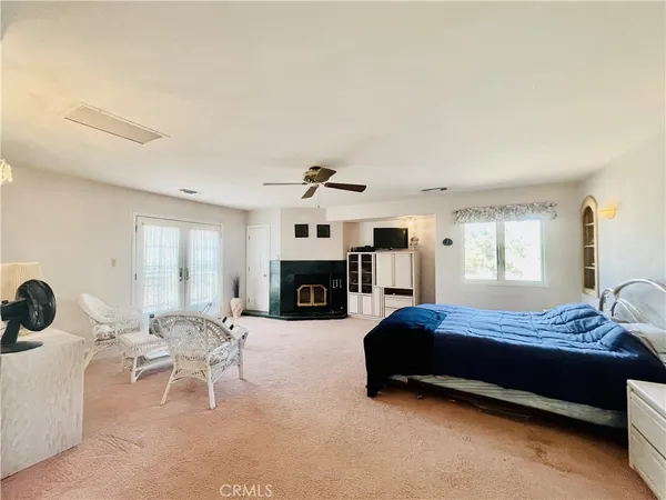 a view of a livingroom with a flat screen tv