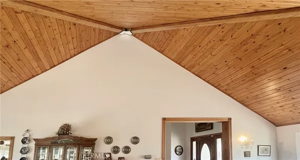 a view of a livingroom with furniture and windows