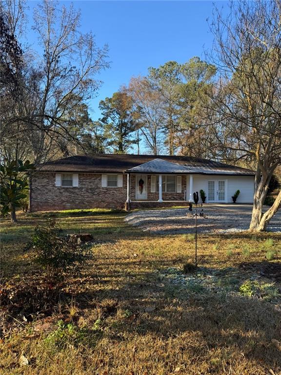 14 Pleasant Ridge Road Carrollton, GA 30117 - Photo 1 of 1 a front view of a house with a yard