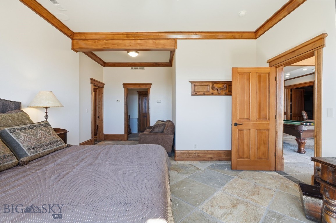 1240 Twin River Cutoff Road Manhattan, MT 59741 - Photo 48 of 88 Lower-level bedroom with bathroom