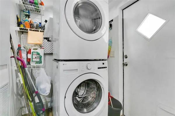a utility room with dryer and washer
