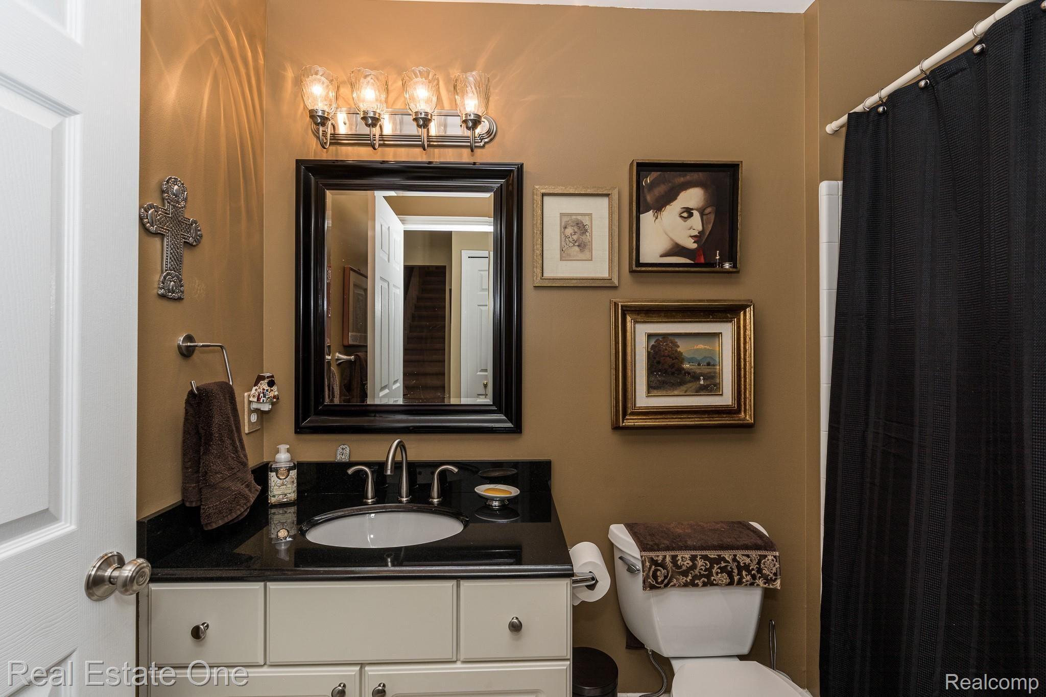 1083 Churchill Circle, Unit 77 Rochester, MI 48307 - Photo 8 of 61 1083 Churchill Circle Full Bathroom on 1st Floor